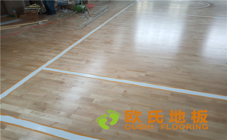 新疆克拉瑪依市獨山子虹園小區(qū)體育館木地板項目-歐氏運動木地板