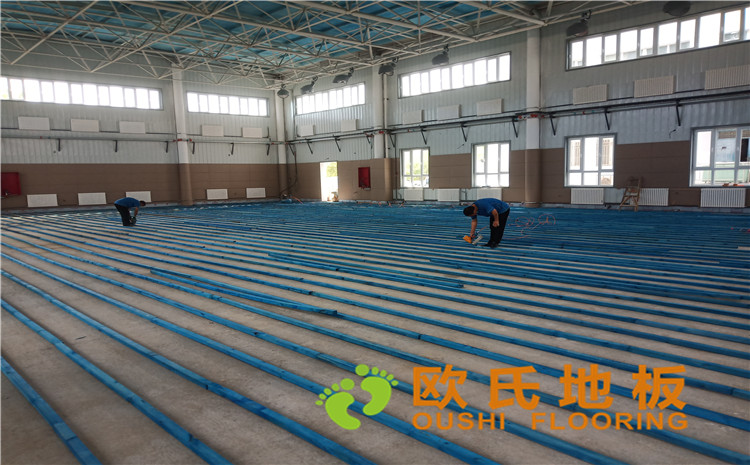 新疆克拉瑪依市獨山子虹園小區(qū)體育館木地板項目-歐氏運動木地板